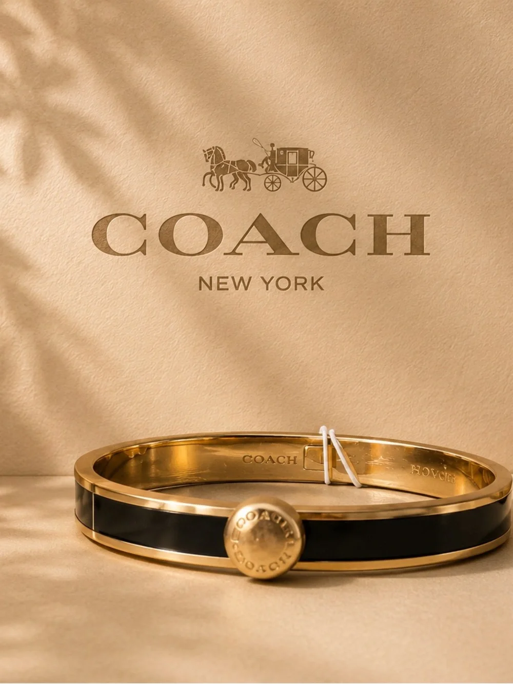 Coach Gold-Tone Bangle with Black Enamel Accent